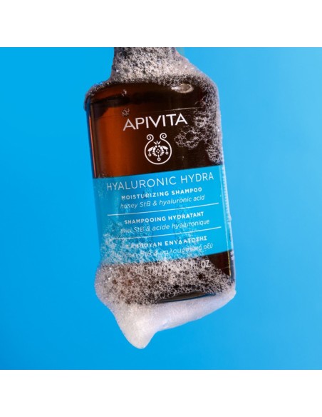 Champú hidratante sin siliconas ni parabenes para un cabello brillante.